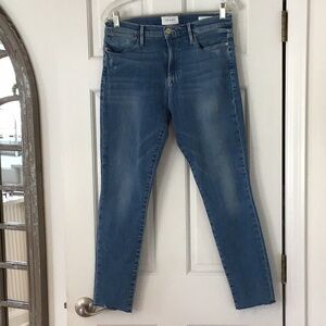 Frame Denim Classic Mid Blue Women's Le High Skinny Jeans with stretch.